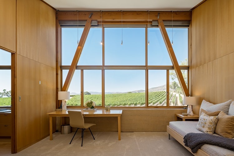 desk and oversized window inside the Meteor Vineyard Estate