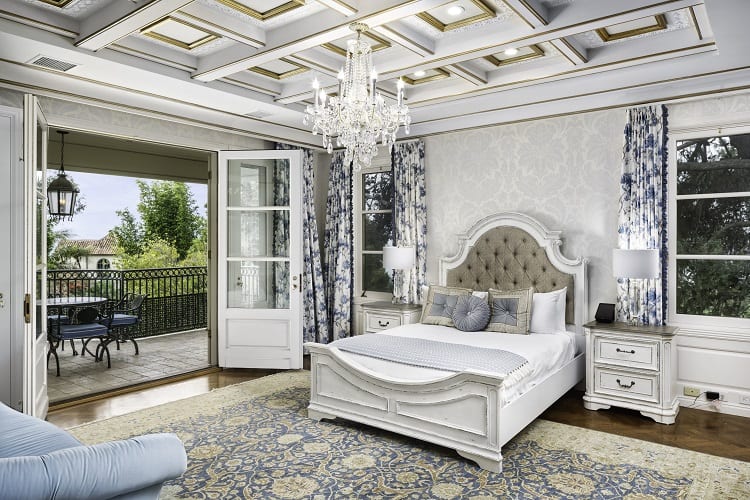 luxury bedroom with vaulted ceiling inside Foxhill Estate in La Jolla, San Diego