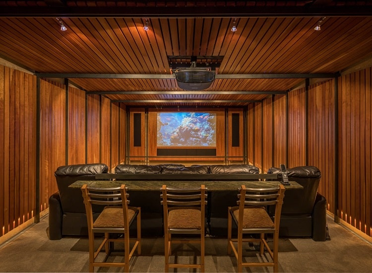 wood-paneled home theater inside the Meteor Vineyard Estate 