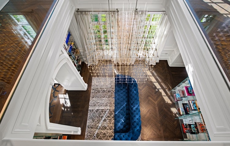 ultra-luxurious living room inside a Connecticut chateau, view from above