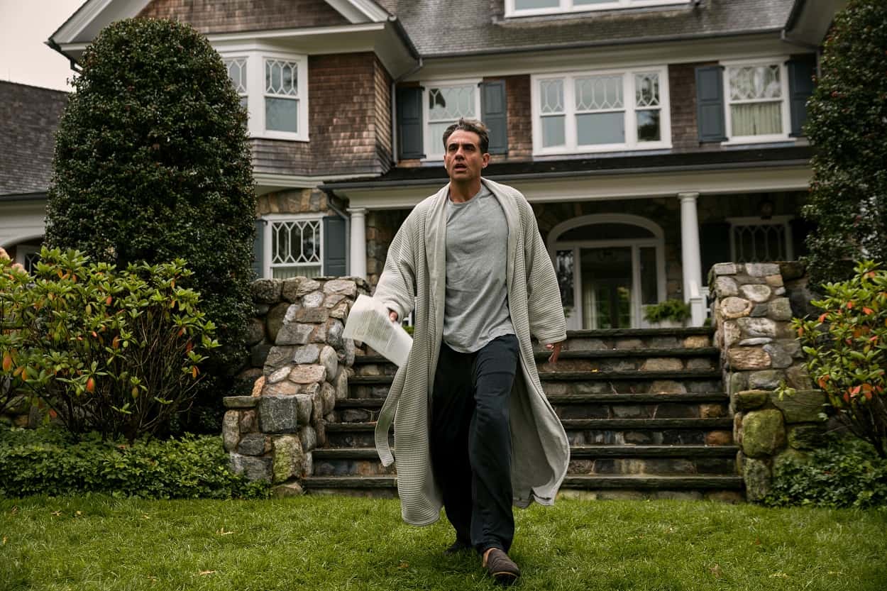 Bobby Cannavale as Dean Brannock in episode 101, seen here on the lawn of the house in The Watcher, wearing a robe. 