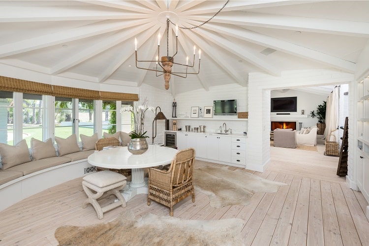 dining area with high pitched white wood ceilings