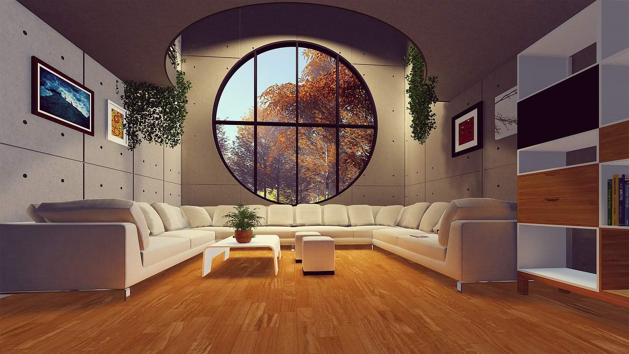 rendering of a luxury living room with a round window and u-shaped sectional sofa