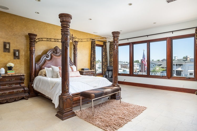 the master bedroom with a four-poster bed