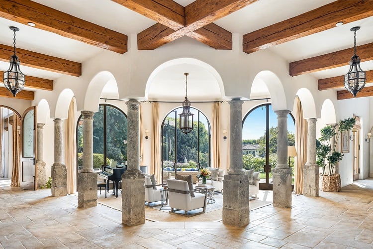 parlor with beam ceiling and picture windows inside sugar ray leonard's house