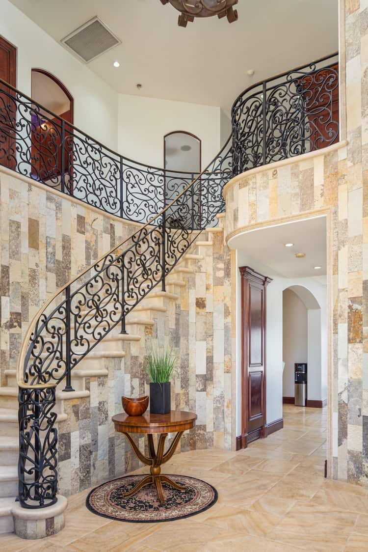 staircase and wrought iron railing inside Tito Ortiz's house