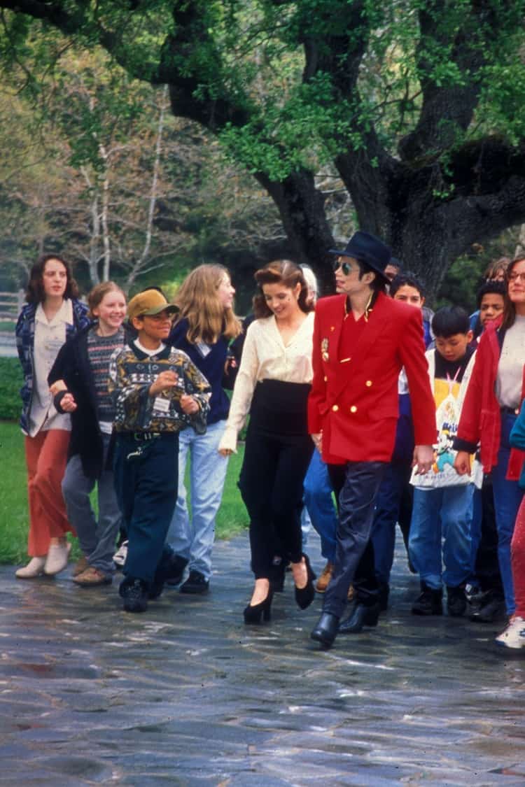 Lisa Marie Presley and Michael Jackson at Neverland Ranch, during a VIP visit by a group of children in April, 1995. 