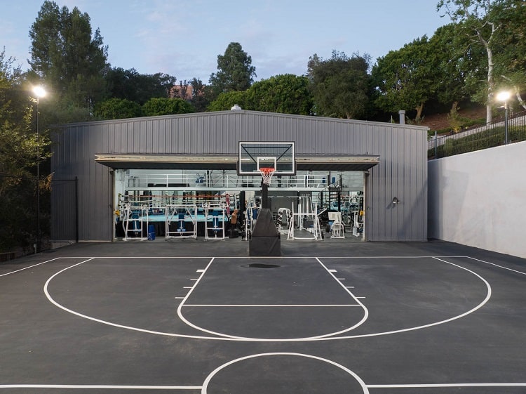 two-story gym with a basketball court in front