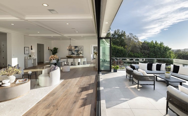 indoor-outdoor living with a sliding glass partition