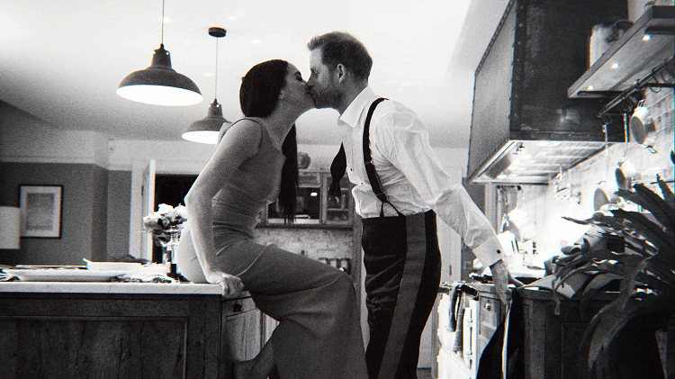 Prince Harry and Meghan, The Duke and Duchess of Sussex kissing in the kitchen