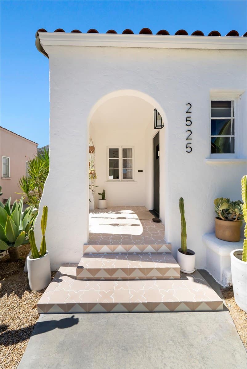 Spanish bungalow with arched entrance