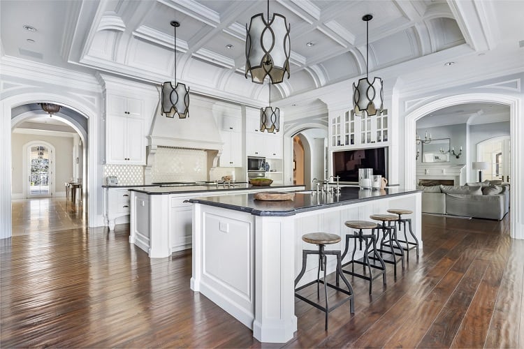 white kitchen with two islands