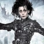 Johnny Depp as Edward Scissorhands on the movie poster, with the castle in the background