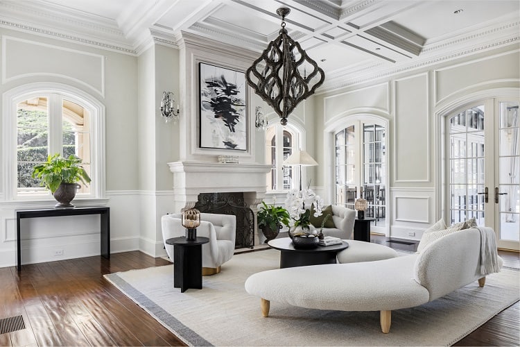 Seating area in front of a fireplace. 