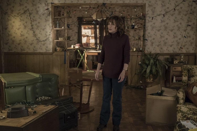 Winona Ryder as Joyce Byers inside the Byers house on Stranger Things