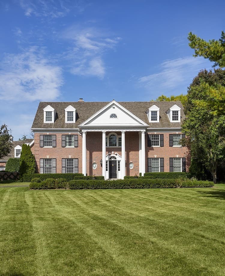 front view of author Andy Weir's house in Winnetka, IL, a Georgian-style brick house