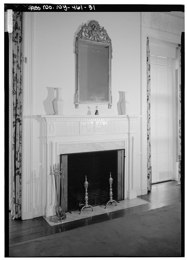 black-and-white photo of the fireplace inside Gracie Mansion, next to which Alexander Hamilton died. 