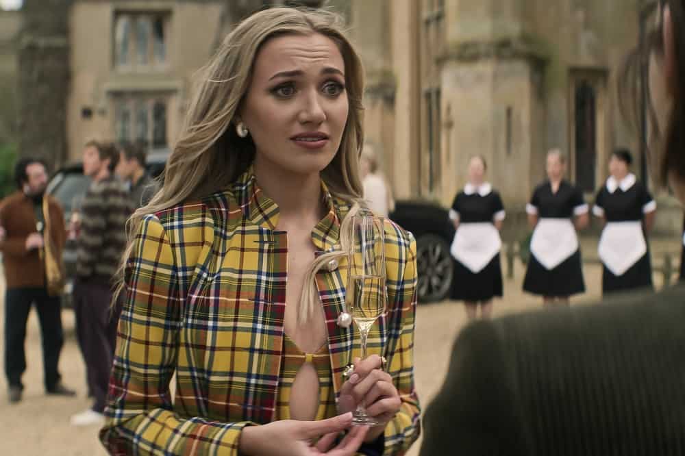 Tilly Keeper as Lady Phoebe Borehall-Blaxworth at her country house in You, Season 4.