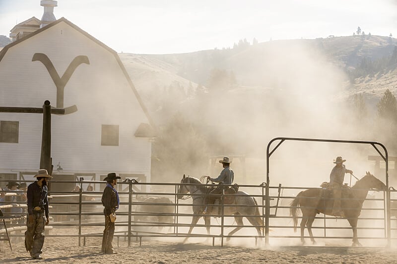 The Yellowstone ranch with horses roaming around 