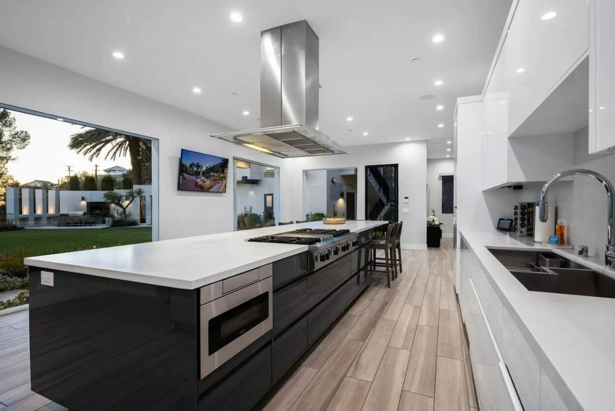 The kitchen inside Bad Bunny's house opens up to the outdoor areas.