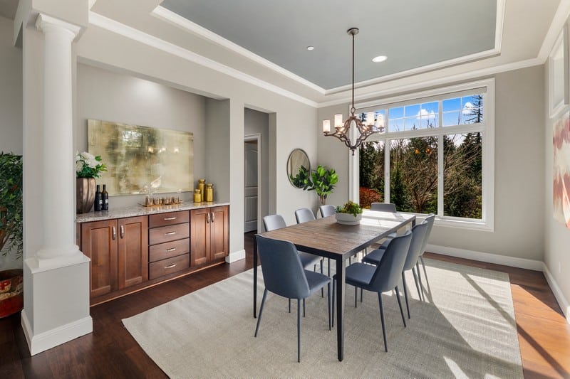 dining room with large window 