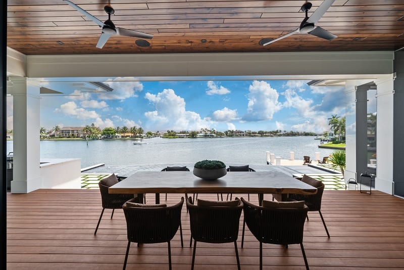 outdoor dining area with views of the water