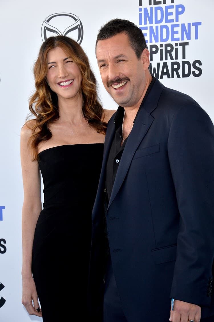 actor Adam Sandler and his wife, Jackie Sandler, wearing black on the red carpet