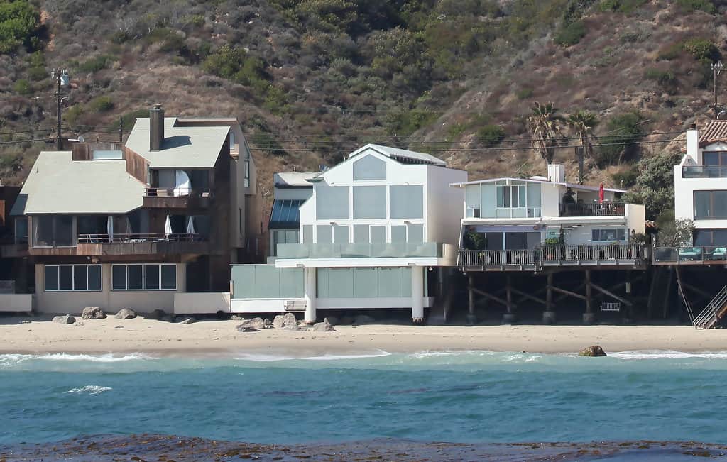 Adam Sandler's house in Malibu, a white beachfront mansion with beach access