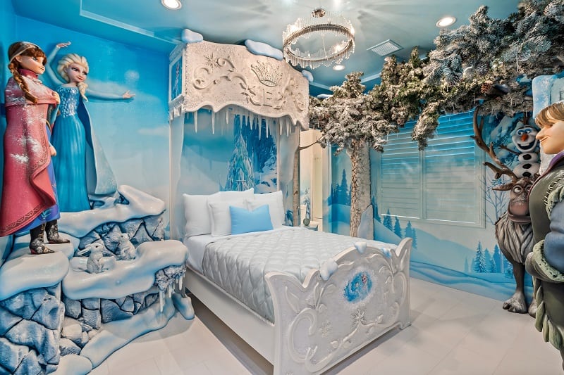 Frozen-themed kids bedroom with figurines from the movie and a bed with toy icycles