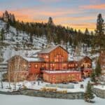 massive three-story log lodge at the Five Ranges Ranch in Montana