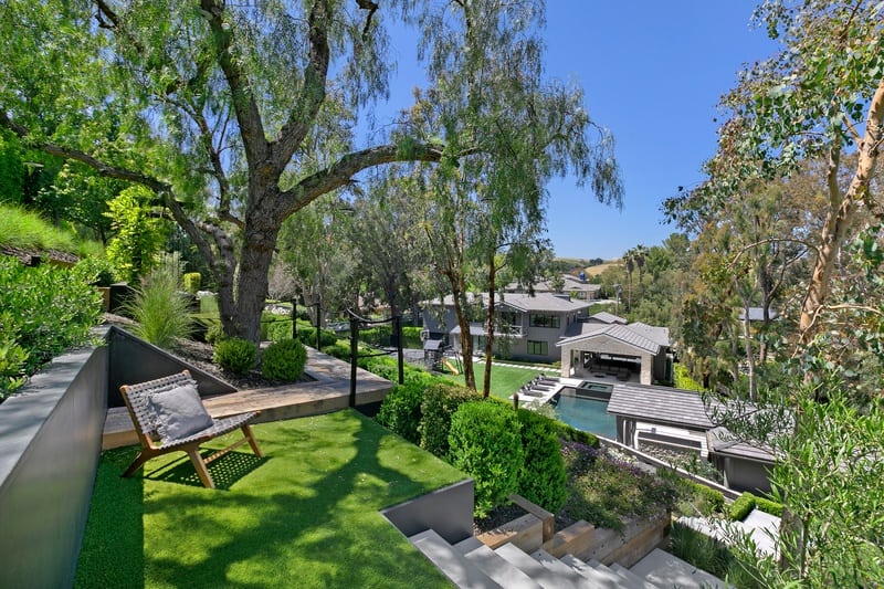 terraced seating with the house in the background