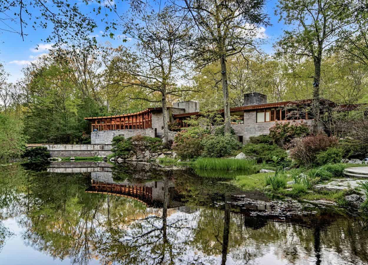 Tirranna, a Frank Lloyd Wright-designed house in New Canaan, CT. The house is shaped like a horse shoe and sits in front of water