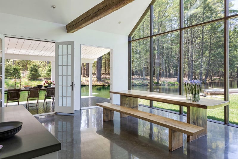 Living and dining area inside the Floating Farmhouse in Eldred, NY. 