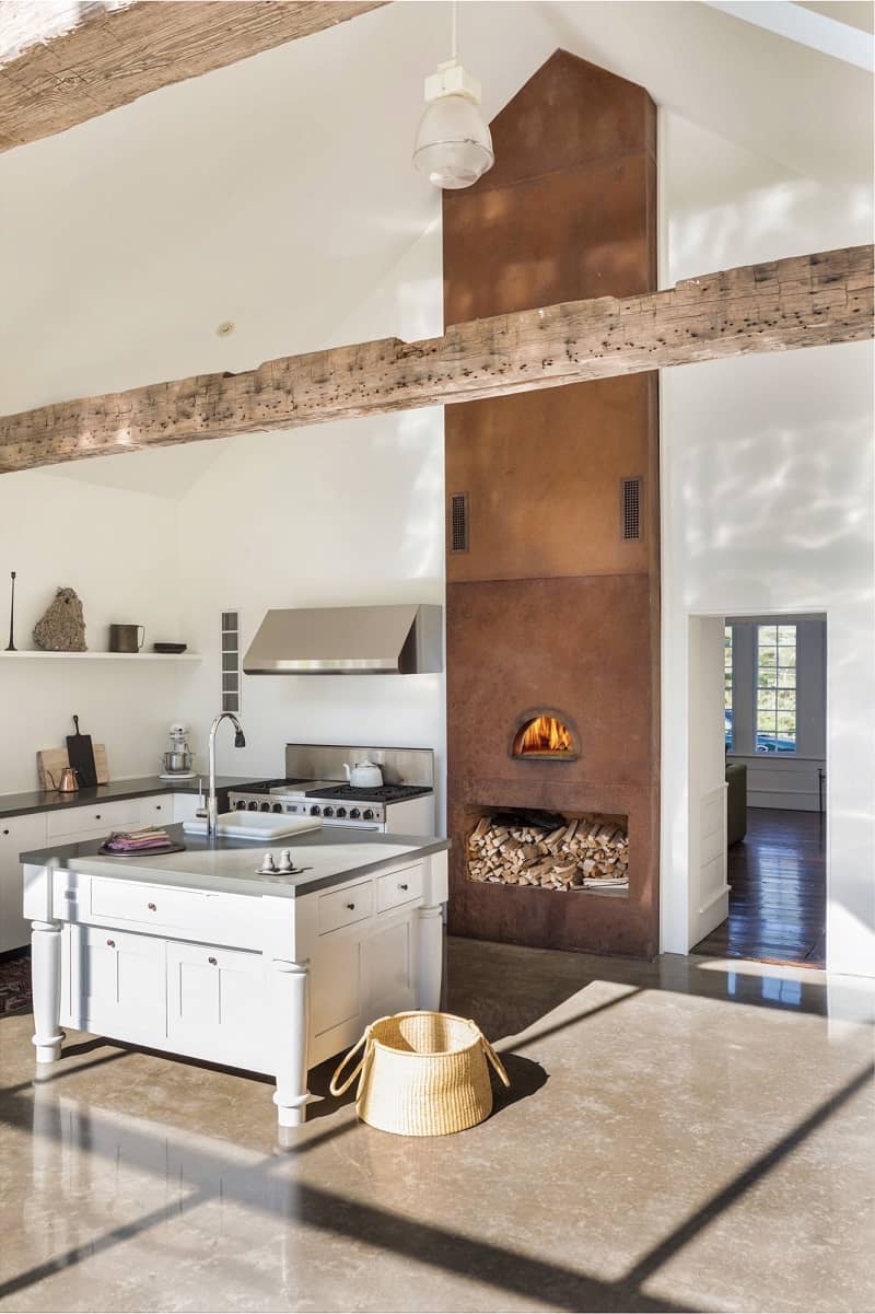 The updated kitchen also sports a wood-burning fireplace.