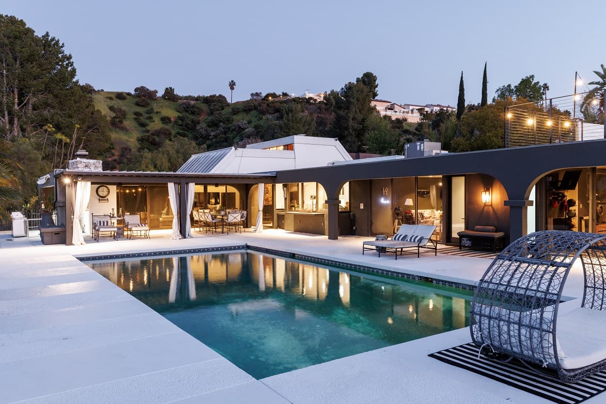 NBA All-Star Kiki VanDeWeghe's house in Encino, seen from the backyard with the pool in front