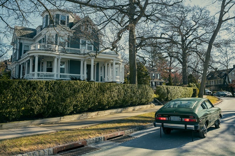 The Watcher house, seen here in episode 106 with a car parked in front. 