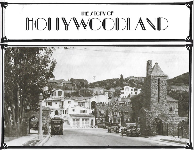 Old black-and-white news clipping showing the entrance to Hollywoodland. Image courtesy of Compass