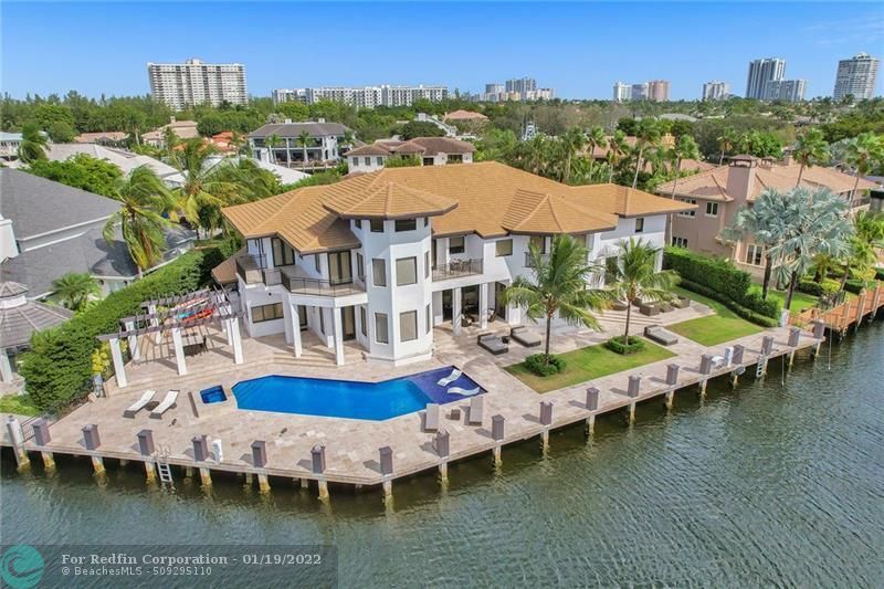 Lionel Messi's house in Fort Lauderdale, Florida, a $10.8 million mansion sitting on a dock with a boot-shaped pool in front