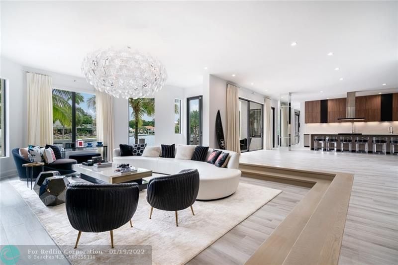 Open floorplan kitchen and living area inside Lionel Messi's house in Fort Lauderdale, Florida