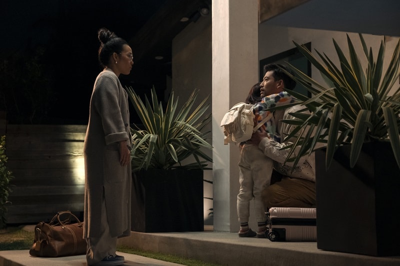 (L to R) Ali Wong as Amy, Remy Holt as June, Joseph Lee as George standing in front of the Beef house in episode 104