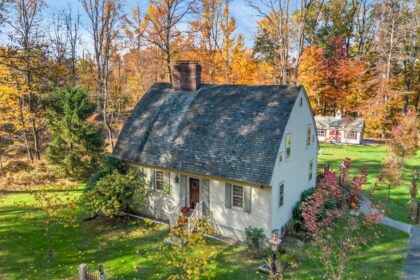 New England Cape Cod 'Bow House' in New Jersey's Delaware County. Photo by Motion City Media