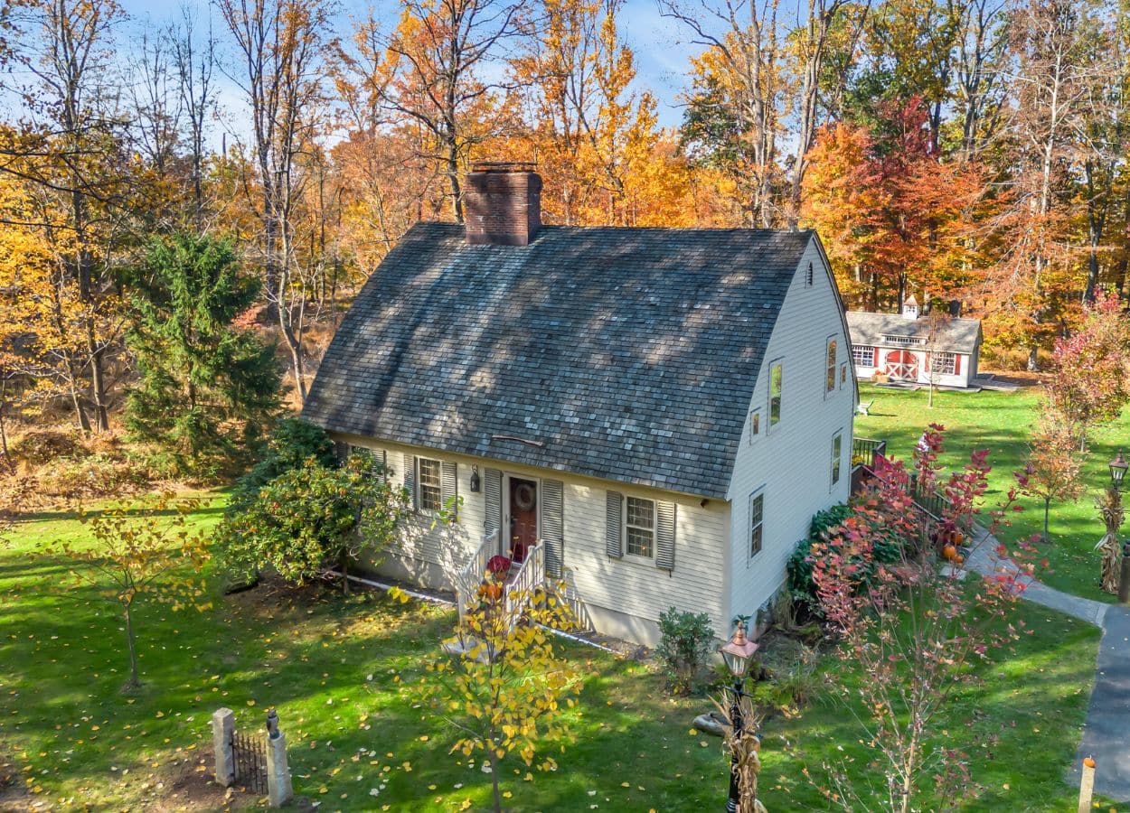 New England Cape Cod 'Bow House' in New Jersey's Delaware County. Photo by Motion City Media