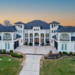 A stately house in Montgomery, TX next to Lake Conroe. Photo credit: Jerzy Carranza, Arresting Motion