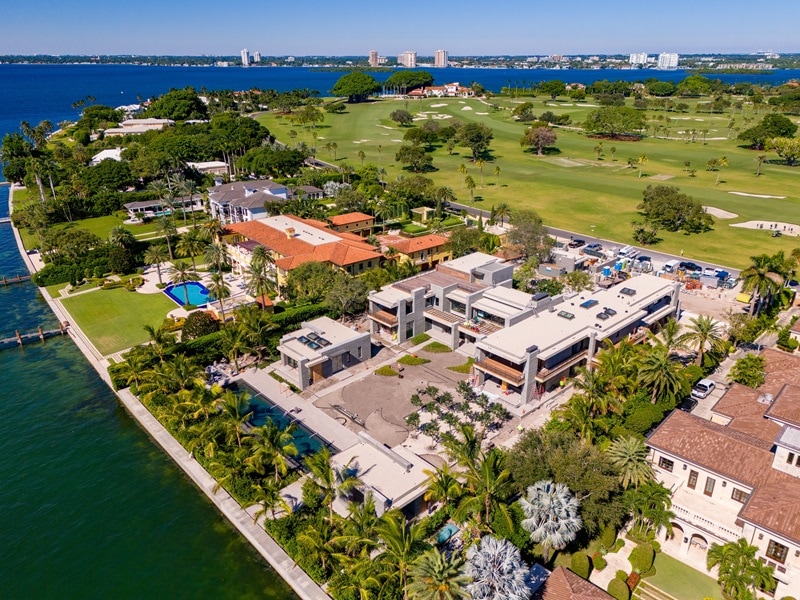 Tom Brady's waterfront mansion on Miami's Indian Creek Island, a two-story structure facing the water with no rear neighbors. 