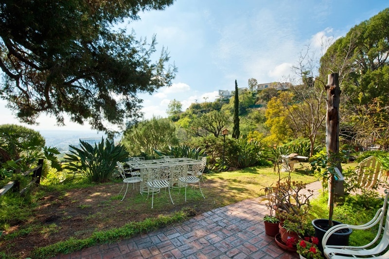 outdoor patio with views of Los Angeles and the Hollywood Hills.