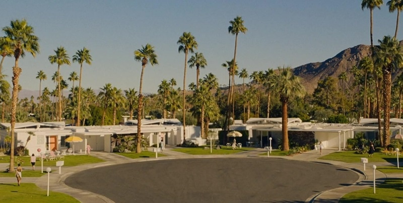 The midcentury modern homes that line the picture-perfect streets of the fictional Victory neighborhood in Don't Worry Darling.