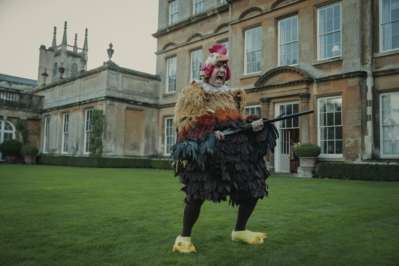 Scene filmed right outside The Gentlemen house, Halstead Manor, portrayed on-screen by the historical Badminton House in Gloucestershire, UK. Photo credit: Netflix