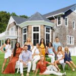 The cast & house in Season 7 of 'Summer House': (l-r) Paige DeSorbo, Ciara Miller, Carl Radke, Lindsay Hubbard, Amanda Batula, Kyle Cooke, Danielle Olivera, Gabby Prescod, Chris Leoni, Mya Allen, Samantha Feher. Photo credit: Sasha Israel / Bravo)