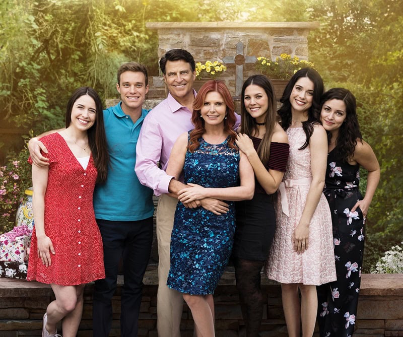 The cast of The Baxters in a promotional poster for the series, showing all the leading actors together, smiling, surrounded by nature