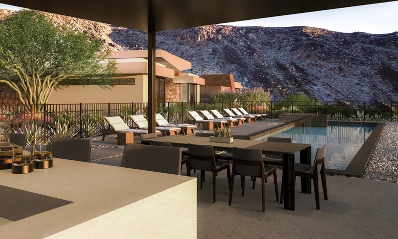 pool with lounging chairs on the side and covered al-fresco dining, seen from the outdoor bar.